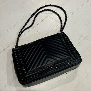 Boutique brand black handbag